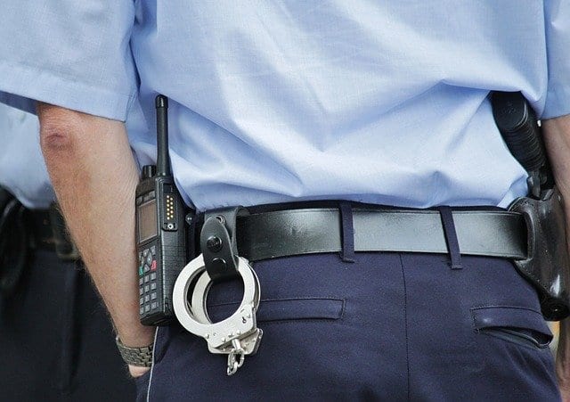 handcuffed police
